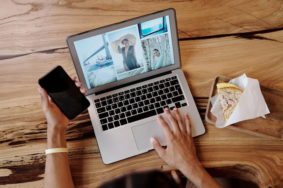 A contemporary workspace showcasing a laptop, tablet, and smartphones, ideal for tech and freelance use.